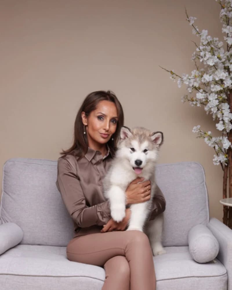 Leonidas, the FurFix Malamute puppy, in Nina’s arms